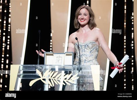 renate reinsve poses with best actress award for the worst person in the world during the