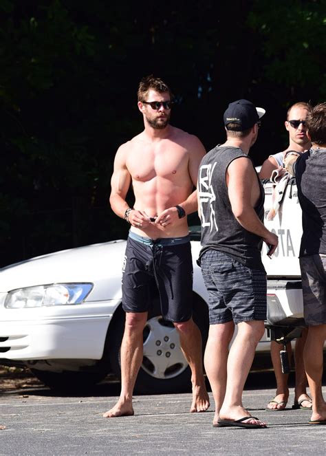 Chris Hemsworth Shows Off Shirtless Superhero Muscles After A Surf Session With His Dad Chris