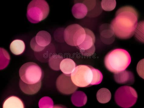 Large Round Soft Glowing Burred Lights Abstract On A Black Background