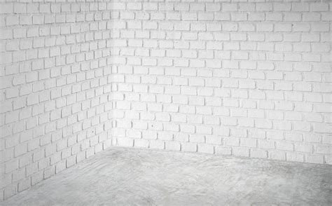 Empty Corner White Modern Brick Wall And Grey Concrete