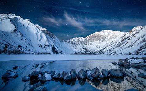 1280x800 Snowy Mountains At Starry Night 1280x800 Resolution Wallpaper