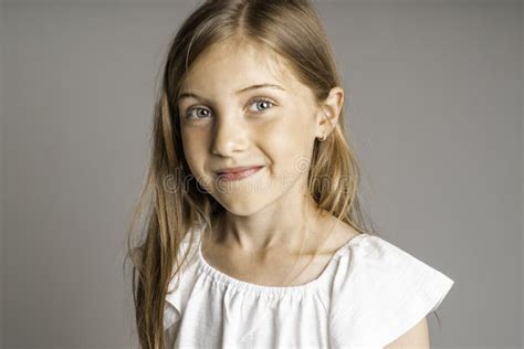 Stylish Little Girl Portrait In The Studio White Background Stock Photo