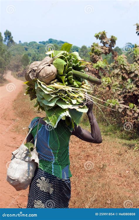 african woman heavy loads on head editorial stock image image of africa tribe 25991854