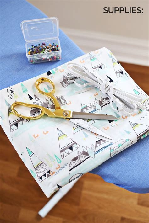 I'm showing an easy diy how to update your ironing board cover. Ironing Board Cover DIY - A Beautiful Mess