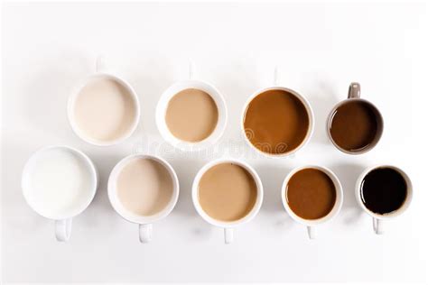 Cups Of Coffee On White Background With Color Gradient Of Coffee Stock