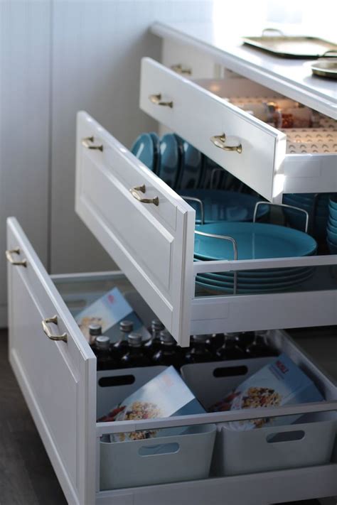 Organize tools, towels, dinnerware or kitchen gadgets to keep them within reach when you need them and out of site. My IKEA Sektion Kitchen!!! | Jillian Harris Design Inc ...