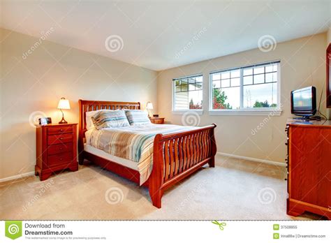 For light to medium walnut colored wood furniture, your best bet is light blue. Warm Colors Bedroom With Wood Furniture Royalty Free Stock ...