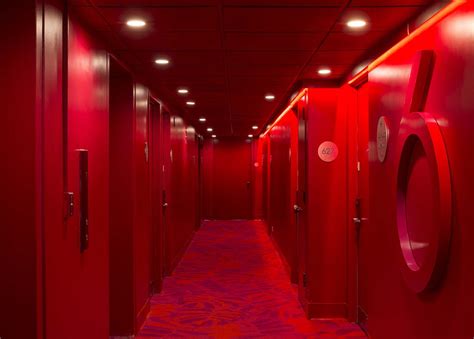 A Raspberry Red Rooms Corridor At The Shoreline Waikiki Red Hotel