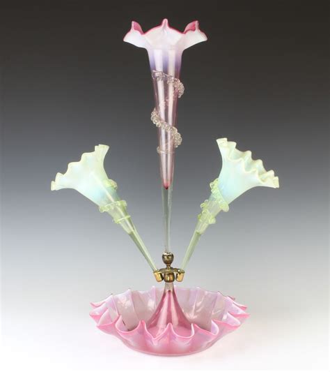 Lot 43 A Victorian Vaseline Glass Epergne With Centre Pink Tapered Flute Flanked By 2 Green