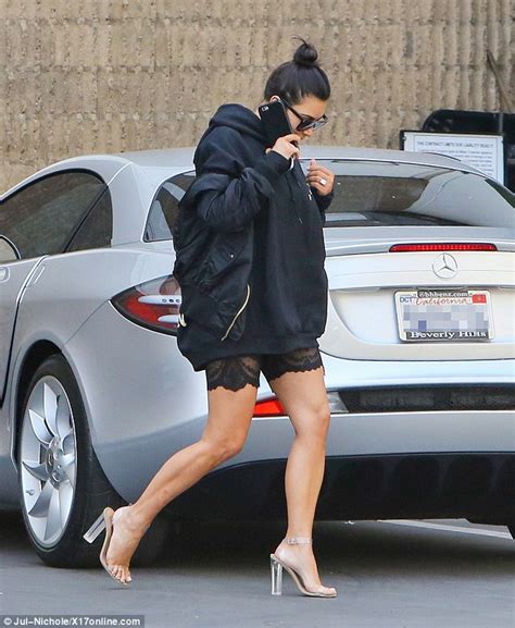 Kim Kardashian Flaunts Her Legs In Lacy Shorts And Heels With Pablo