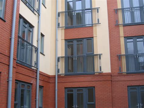 Twenty times more resistant to a: Metal Juliette balcony balustrade powdercoated to RAL 7016 ...