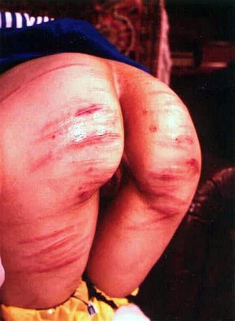 Bloody Caning Her Butt
