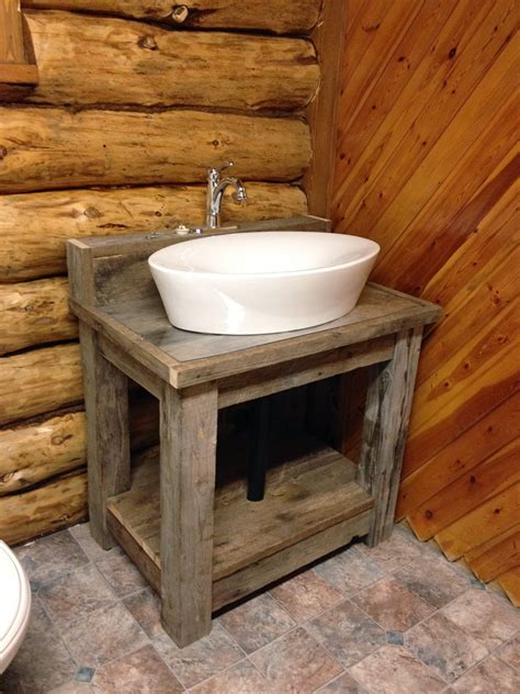 The base is made from solid engineered wood and has a herringbone design on the front for a touch of pattern. MacGIRLver: Reclaimed Wood Bathroom Vanity