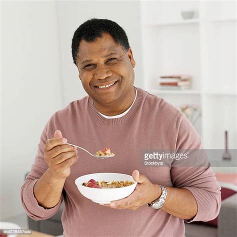 Black Man Eating Cereal Photos And Premium High Res Pictures Getty Images