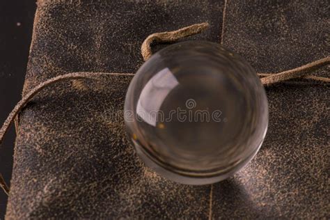 Mystic Glass Ball On A Book With Old Leather Cover Stock Image Image