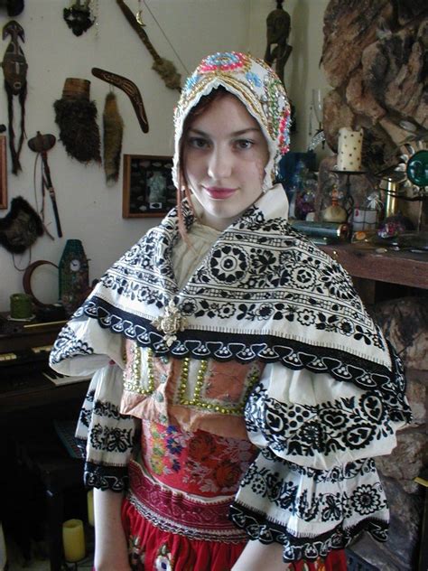 Traditional dress of the czech republic is truly the legacy of the bohemian and moravian photo about czech, dressed, woman, parade, handiwork, national, festival, tradition, colourful, costume, traditional, moravian, folk. czech costume - love the black and white design ...