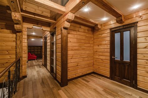 This bathroom is brought to life with an antique porcelain bathtub that perfectly matches the white chinking in the walls. Ideas for a Cabin Ceiling | eHow