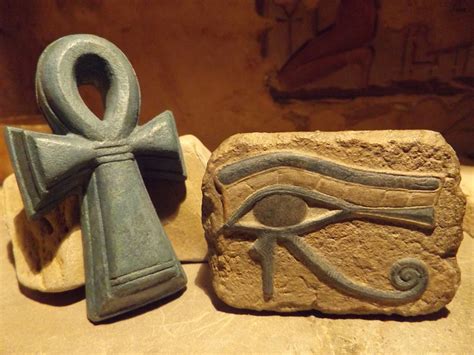 Egyptian Art - Eye of Horus and Ankh amulet. Ancient Egypt carving