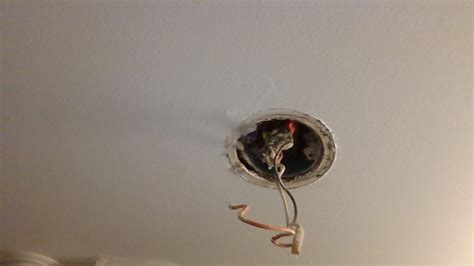 Try vacuuming the alarm off particularly around the sensor if the cover is removable. hanging - What should I do with the wires before I put a ...