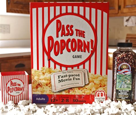 A Hand Holding Up A Box Of Popcorn With The Words Pass The Popcorn Game On It