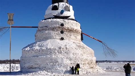 Man Builds Giant 50 Foot Tall Snowman With Entire Trees For Arms