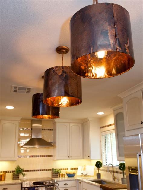 Choose island lighting, pendant lighting, under cabinet lighting and more. White Kitchen With Copper Light Fixtures | HGTV
