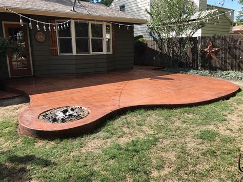 Make the concrete patio outline using stakes and string. Faux Wood Stamped Colored Concrete Patio - All Iowa ...