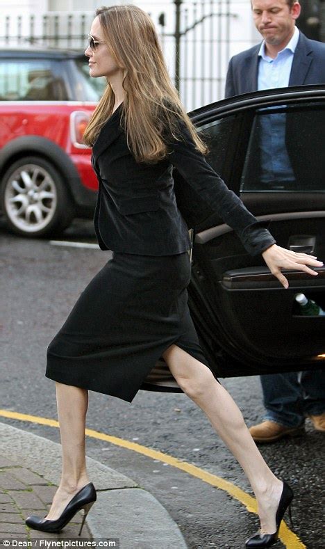 Pale And Pin Thin Angelina Jolie Reveals Her Sinewy Legs In A Pencil