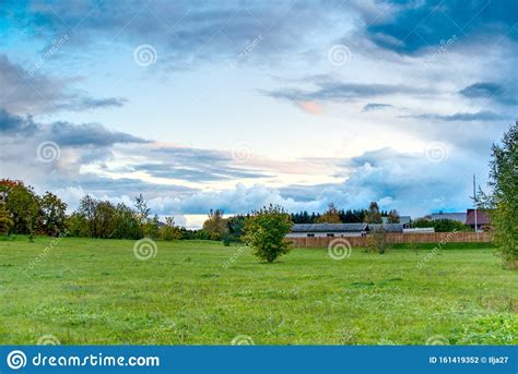 Hdr Landscape Green Meadow And Clouds In The Sky Stock Photo Image Of