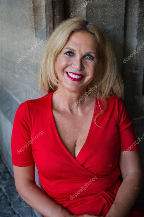 Portrait Of Mature Blonde Woman Wearing Red Dress — Stock