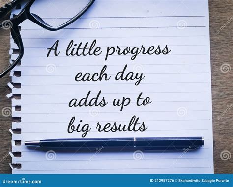 Phrase a LITTLE PROGRESS EACH DAY ADDS UP TO BIG RESULTS Written on a