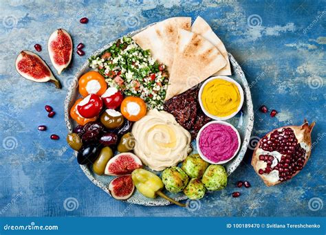 Middle Eastern Meze Platter With Green Falafel Pita Sun Dried