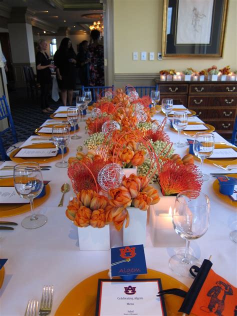 Remember whether it is a weeknight dinner or party dinner for the guest we have to do settings of the tables in a proper manner through which our guests will be impressed. Graduation Party Ideas. LOVE the flowers as a centerpiece ...