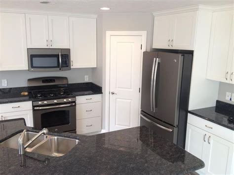 White kitchen cabinets with black slate appliances. slate appliances with white cabinets - Google Search ...