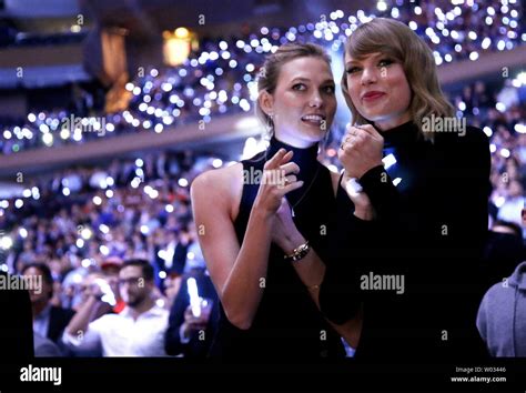 Karlie Kloss And Taylor Swift Watch The Team Introductions Prior To The