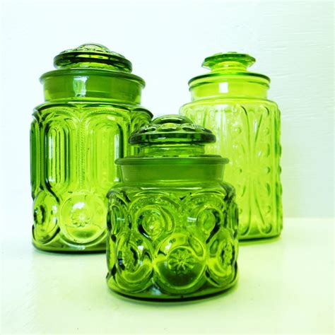 Glass kitchen canisters are the solution for you if you want to make your kitchen in the house to be more organized. Vintage Green Glass Canister Jars | Vintage green glass ...