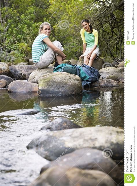 Friends Relaxing By Stream Stock Image Image Of Relaxation 29657557