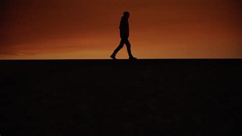 Lonely Man Walking Alone On Horizon Stock Footage Video 100 Royalty