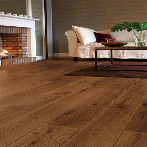 Vintage pewter oak has an inviting warm grey color that is neutral in tone coordinating with almost any home decor. The QuickStep Perspective Vintage Oak Laminate Floor is ...