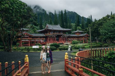 Girls In Byodo In Buddhist Temple Island Oahu Hawaii Stock Photo