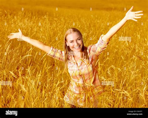Picture Of Happy Cheerful Girl Having Fun On Wheat Field Beautiful
