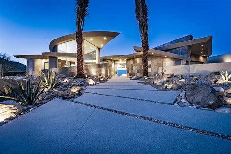 Take A Look Inside This Futuristic Curvilinear Desert Residence By