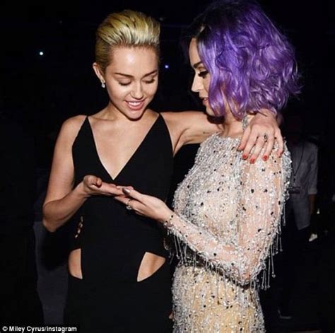 Miley Cyrus Playfully Fondles Fellow Pop Princess Katy Perrys Chest At