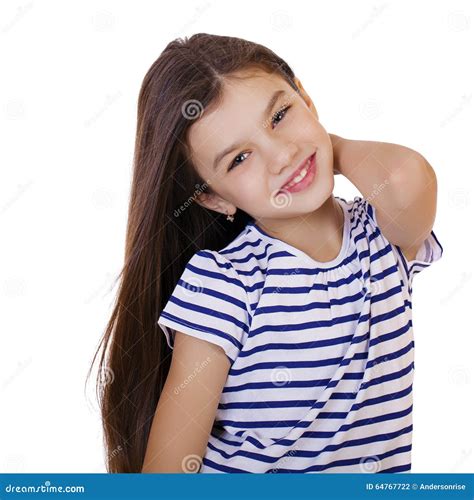 Portrait Of A Charming Little Girl Smiling At Camera Stock Photo