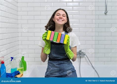 Portrait Of Teen Girl Doing Cleaning In Bathroom Stock Photo Image Of