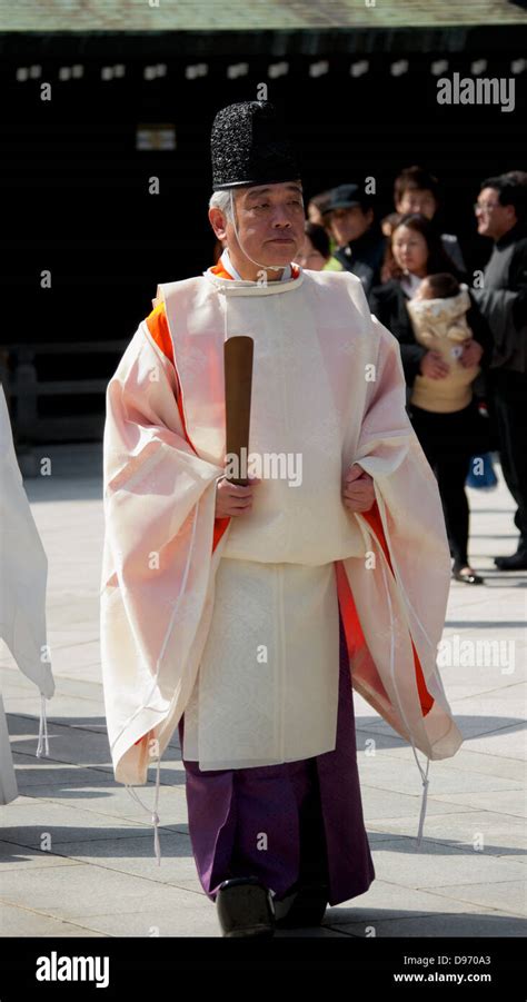 Shinto Priest Kannushi At Meiji Shrine Conducting Religious Rites