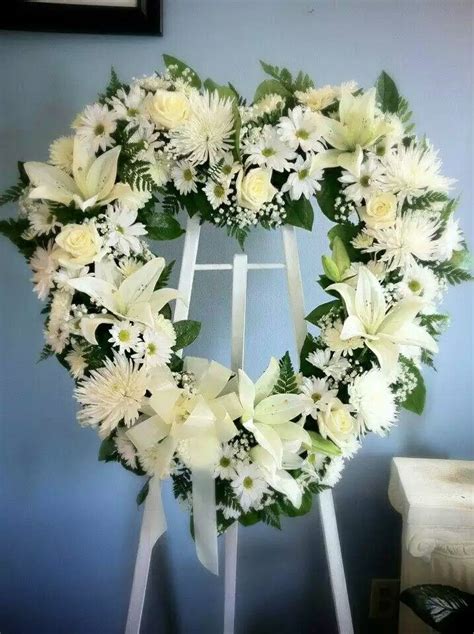 Heart Shaped Easel Spray With Lilies Roses Daisies
