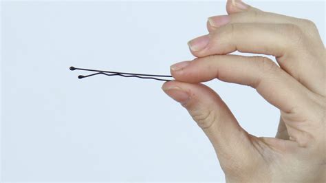 Once again insert our bobby pin tension wrench into the lock and give it the necessary pressure to bind the first binding pin. 4 Ways to Use a Bobby Pin - wikiHow