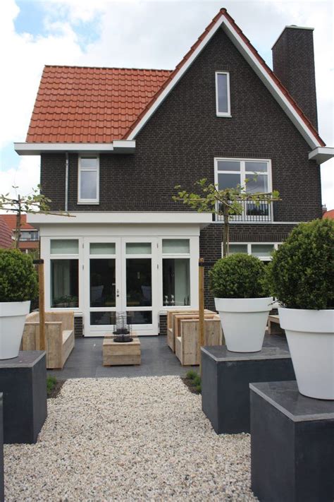 Maybe you would like to learn more about one of these? Image result for dark gray house with red brick | Red roof ...