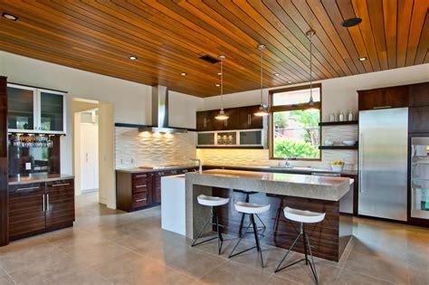 The acoustic wood ceiling panels are cut into size so that it is suitable for use between the profiles or wood battens. Photo Page | HGTV